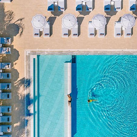 Ivi Mare - Designed For Adults By Louis Hotels Geroskipou Exteriör bild Aerial view of the pool at the Hotel du Cap-Eden-Roc, Cap d'Antibes, France