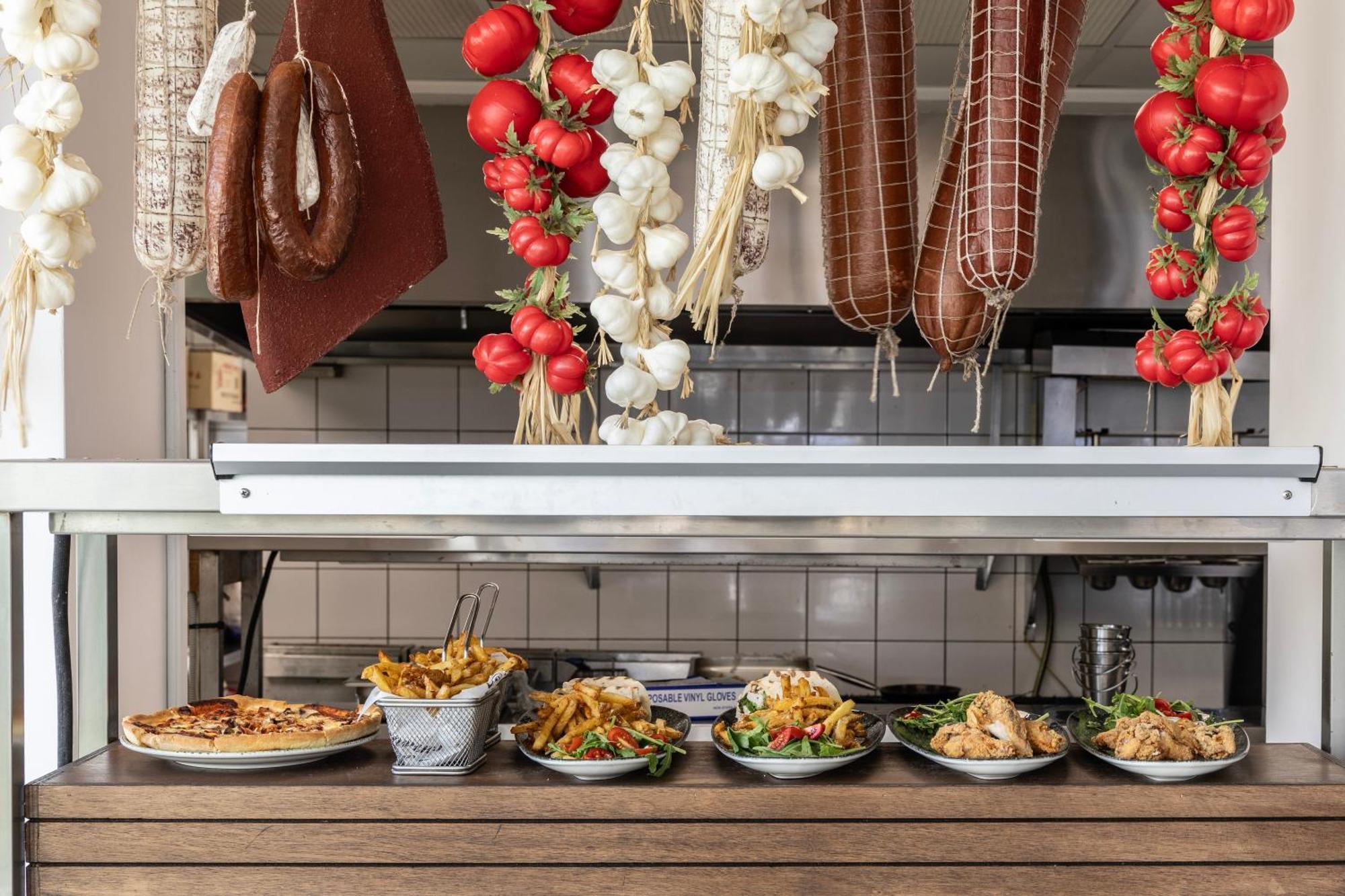 Ivi Mare - Designed For Adults By Louis Hotels Geroskipou Exteriör bild A display of prepared tapas at a restaurant in Madrid